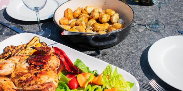 Food being served on a granite worktop