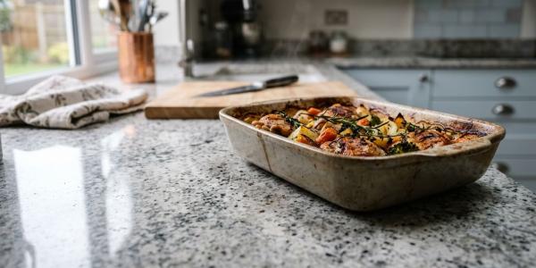 Food prepared on a grey quartz worktop