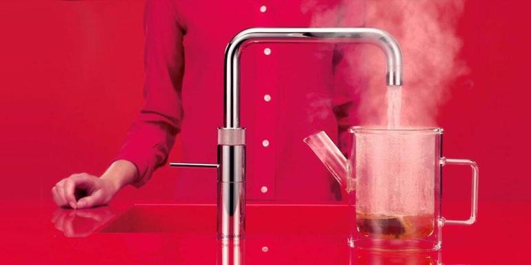 someone using a quooker boiling tap